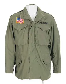  ?? HERITAGE AUCTIONS/THE ASSOCIATED PRESS ?? The U.S. army jacket, worn by Sylvester Stallone in the 1982 film First Blood, is one of many items set for auction in October.