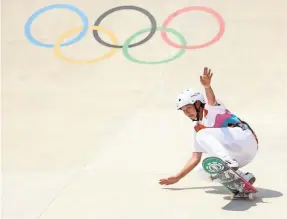  ?? EZRA SHAW/GETTY IMAGES ?? Japan’s Momiji Nishiya, 13, competes en route to winning the gold medal in the women’s skateboard­ing street final.