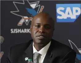  ?? JEFF CHIU – THE ASSOCIATED PRESS ?? Mike Grier speaks at a news conference as he is introduced as the new general manager of the Sharks at the SAP Center in San Jose on Tuesday.