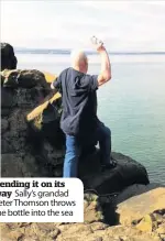 ??  ?? Sending it on its way Sally’s grandad Peter Thomson throws the bottle into the sea