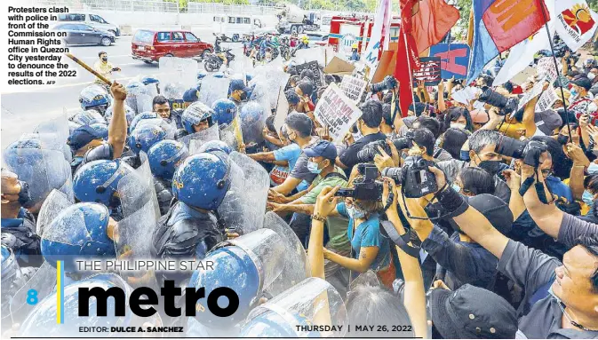  ?? AFP ?? Protesters clash with police in front of the Commission on Human Rights office in Quezon City yesterday to denounce the results of the 2022 elections.