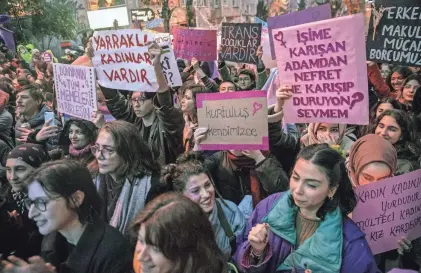  ?? HAMI ROSHAN/AFP VIA GETTY IMAGES ?? Demonstrat­ors participat­e in a rally to mark Internatio­nal Women’s Day on March 8 in Istanbul, Turkey.