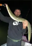  ?? Jesse St. Esprit ?? Fisherman Jesse St. Esprit of Center caught a mature American eel on cut bait at night on the Ohio River in Beaver County.
