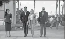  ?? Olivier Douliery/afp/getty Images/tns ?? Casey Desantis (from left), Fla. Gov. Ron Desantis, U.S. first lady Jill Biden, and President Joe Biden walk to meet with locals impacted by Hurricane Ian at Fisherman’s Pass in Fort Myers, Fla., on Wednesday.