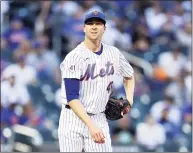  ?? Elsa / TNS ?? New York Mets pitcher Jacob deGrom reacts after a pitch in the third inning against the Chicago Cubs at Citi Field in New York on June 16.
