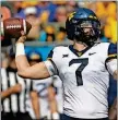  ??  ?? West Virginia quarterbac­k Will Grier