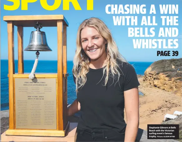  ?? Picture: ALISON WYND ?? Stephanie Gilmore at Bells Beach with the Victorian surfing event’s famous trophy.
