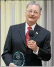  ?? KELSEY LEYVA — THE MORNING JOURNAL ?? 2017 Veteran of the Year Joe Horvath, of Amherst Township, says a few words after receiving his award April 22 while at the Lorain Veterans Council’s 71st annual banquet at the Italian American Veterans Post #1.