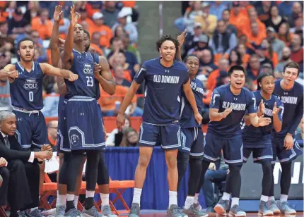  ?? RICH BARNES/USA TODAY SPORTS ?? Old Dominion players react to a made basket against Syracuse during the second half on Dec. 15 at the Carrier Dome in Syracuse, New York.
