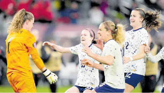  ?? AP ?? United States goalkeeper Alyssa Naeher (left) celebrates with teammates at the end of the penalty shootout in a Concacaf Women’s Gold Cup semifinal match against Canada on Wednesday, March 6, 2024, in San Diego.