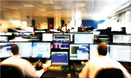  ?? ?? FTSE 100 recovered almost all its losses from earlier in the week. Photograph: Paul Painter/Alamy