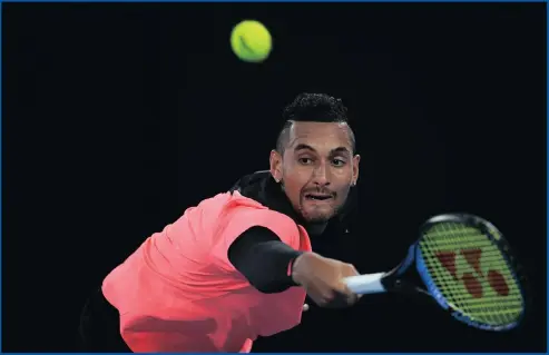  ??  ?? Australia’s Nick Kyrgios on his way to beating Jo-Wilfried Tsonga, the Frenchman who signed autographs for him at age 12, in four closely-contested sets in the third round of the Australian Open in Melbourne yesterday.