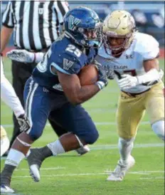  ?? PETE BANNAN — DIGITAL FIRST MEDIA ?? Running back Aaron Forbes scored the only touchdown for Villanova Saturday in a 13-10 loss to Maine.