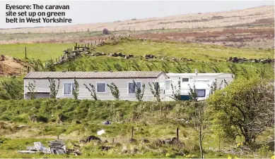  ??  ?? Eyesore: The caravan site set up on green belt in West Yorkshire