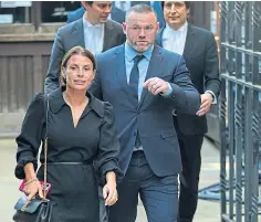  ?? ?? “STRUGGLE”: Coleen and Wayne Rooney leave the court.