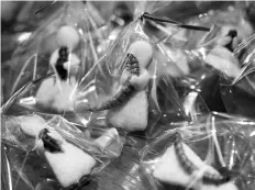  ??  ?? Cookies with insects are pictured at a bar in downtown Tokyo February 12, 2017. — Reuters photo