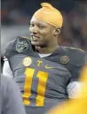  ?? Mark Humphrey/Associated ?? Joshua Dobbs is very often the brightest guy in the room.