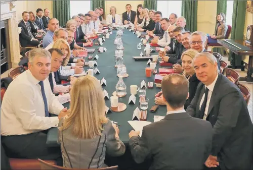  ?? PICTURE: DOWNING STREET/PA. ?? NEW TEAM: The Prime Minister tweeted this picture of her Cabinet with the message: “Productive Cabinet meeting this morning – looking ahead to a busy week.”