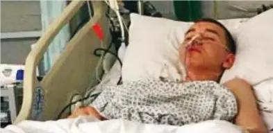  ?? ?? Stricken: Seventeen-year-old Ross Hedley lying in hospital after the street attack