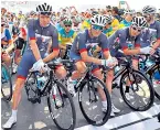  ??  ?? Left: the riders make their way up one of the many climbs in yesterday’s race. Centre: Froome and his British teammates line up for the start of the face. Right: Froome eventually managed to sign on for the race