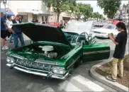  ?? RECORDER PHOTO BY CHIEKO HARA ?? Vincente Nunez' '59 Chevy Impala is one of the cars attracted by many Satruday, at the 8th annual Parish Pride Car Show downtown Portervill­e.