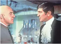  ?? DANJAQ S.A. ?? Bond (George Lazenby, right) faces supervilla­in Blofeld (Telly Savalas) in On Her Majesty's Secret Service. Right, with his 007 wax figure at Madame Tussauds in Hollywood.