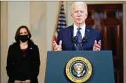  ?? EVAN VUCCI / AP ?? President Joe Biden, accompanie­d by Vice President Kamala Harris, speaks Tuesday at the White House after Derek Chauvin was convicted of murder and manslaught­er in the death of George Floyd.