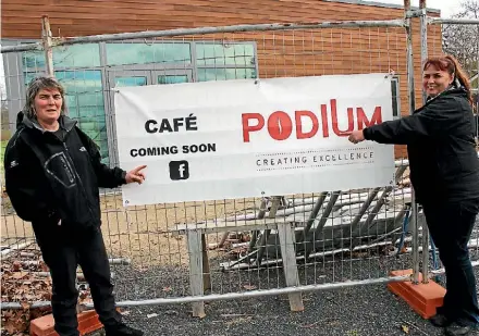  ?? MIKE BAIN ?? Ali Foers and Kim Lee point to their future cafe Podium, opening next month at the Mighty River Domain.