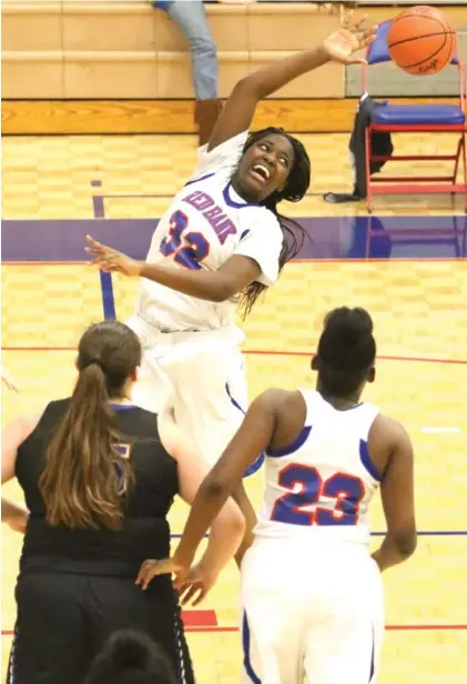  ?? STAFF PHOTOS BY DAN HENRY ?? Red Bank's M'Benda Ndiaye makes a pass while playing Sweetwater during their matchup at the Lady Lions' home court on Friday. Red Bank won over Sweetwater with a final score of 67-47.