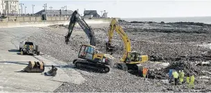  ?? PETER BOLTER ?? Work begins on the Tarmac beach in Porthcawl