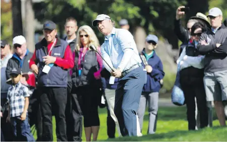  ??  ?? Scott McCarron chips onto the second green during the second round of the PGA Tour Champions’ Pacific Links Bear Mountain Championsh­ip on Saturday. He takes a two-shot lead into today’s third and final round after recording a 5-under 66 in the second.