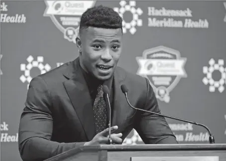  ?? JULIE JACOBSON/AP PHOTO ?? Running back Saquon Barkley responds to a question Saturday during a news conference in East Rutherford, N.J. Barkley was selected as the No. 2 overall pick in the NFL draft by the New York Giants.