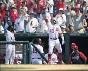  ?? NICK WASS — THE ASSOCIATED PRESS ?? Washington’s Kyle Schwarber takes a curtain call after hitting a two-run home run in the seventh inning Sunday.