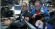  ?? RICHARD DREW — THE ASSOCIATED PRESS FILE ?? Specialist Anthony Rinaldi, left, and trader Michael Conlon work at the New York Stock Exchange.