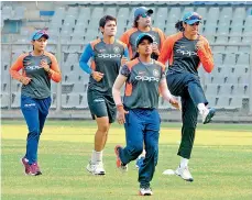  ??  ?? The Indian women’s team at a practice session in this file photo.