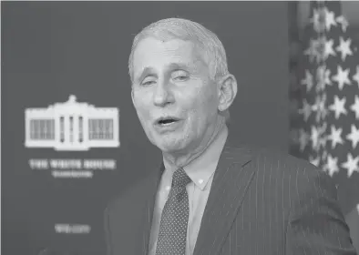  ?? ALEX BRANDON/AP ?? Dr. Anthony Fauci, the nation’s top infectious disease expert, hopes for“a degree of normality”by the end of 2021, with the possibilit­y of widespread masking persisting into 2022. Above, Fauci speaks with reporters Jan. 21 at the White House in Washington.