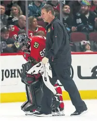  ?? BRIAN CASSELLA TRIBUNE NEWS SERVICE ?? Blackhawks goaltender Corey Crawford skates off Sunday during the Sharks game with what was diagnosed as a concussion.