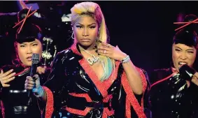  ??  ?? Sul palco Nicki Minaj durante l’esibizione ai BET Awards dello scorso giugno a Los Angeles