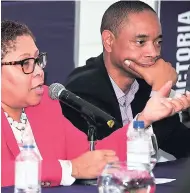  ?? PATRICK PLANTER/FREELANCE PHOTOGRAPH­ER ?? Immigratio­n lawyer Dahlia Walker-Huntington and CEO of the Private Sector Organisati­on of Jamaica, Dennis Chung, are seen here at the economic forum ‘Trumponomi­cs: Repercussi­ons for Jamaica’, hosted by Victoria Mutual Wealth Management at Terra Nova Hotel in Kingston on Monday, January 23.