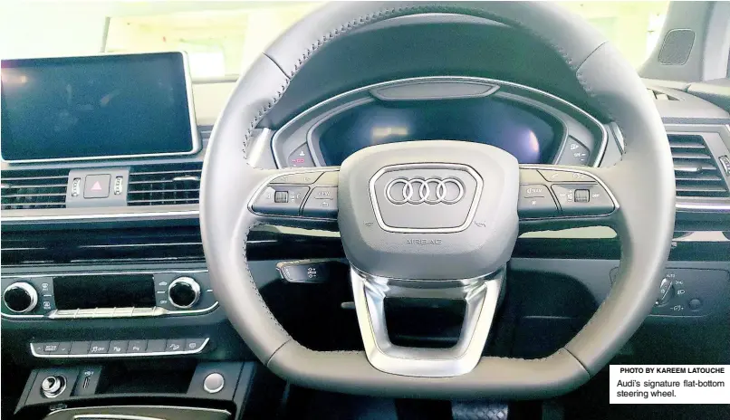  ??  ?? Audi’s signature flat-bottom steering wheel.