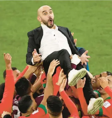  ?? ALEXANDER HASSENSTEI­N/GETTY ?? Upsets like Morocco’s victory over traditiona­l power Spain on Tuesday likely will be more common when the World Cup expands from 32 to 48 teams in 2026. Expect to also see more lopsided matches in the tournament.