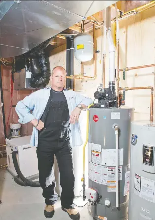  ?? ALEX SCHULDTZ/THE HOLMES GROUP ?? “Look for signs of leaks around fixtures, faucets and appliances,” Mike Holmes says.
