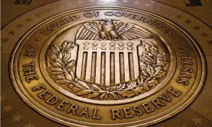  ?? Photograph: Andrew Harnik/AP ?? ‘Aggressive efforts must be taken across the public and private sectors to limit the losses to jobs and incomes and to promote a swift recovery once the disruption­s abate,’ the central bank said in a statement.