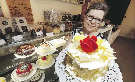  ?? DAVID BLOOM ?? The Art of Cake owners Gloria Bednarz, above, and Guenter Hess have expanded from a small takeout spot in the Edmonton City Centre to a full café and dessert shop at 11807C 105 Ave.