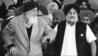  ?? Gurmeet Singh ?? Punjab Chief Minister Parkash Singh Badal, who turned 89 on Thursday, with son and Deputy Chief Minister Sukhbir Badal at a rally in Moga on Thursday,