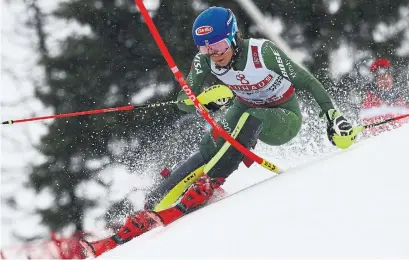  ?? ALESSANDRO TROVATI THE ASSOCIATED PRESS ?? Mikaela Shiffrin won her fifth world title, and record fourth in a row in the women’s slalom in Are, Sweden on Saturday.