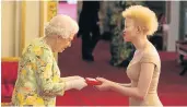  ?? Picture: GETTY IMAGES ?? DIGNIFIED: South Africa’s Siposetu Sethu Mbuli receives her Young Leaders Award from Queen Elizabeth II during the Queen’s Young Leaders Awards Ceremony at Buckingham Palace.