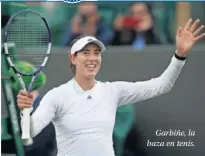  ??  ?? Garbiñe, la baza en tenis.