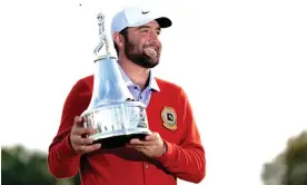  ?? John Raoux/AP ?? Scottie Scheffler holds the trophy and wears the winner’s cardigan at Bay Hill. Photograph: