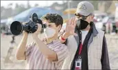  ?? Universal Pictures and Amblin Entertainm­ent ?? Merie Weismiller Wallace
DOES a directing nomination await Steven Spielberg, right, with Gabriel LaBelle, for “The Fabelmans”?